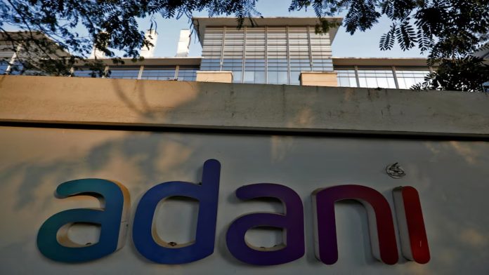 Backer GQG’s $10-billion Adani bet under threat