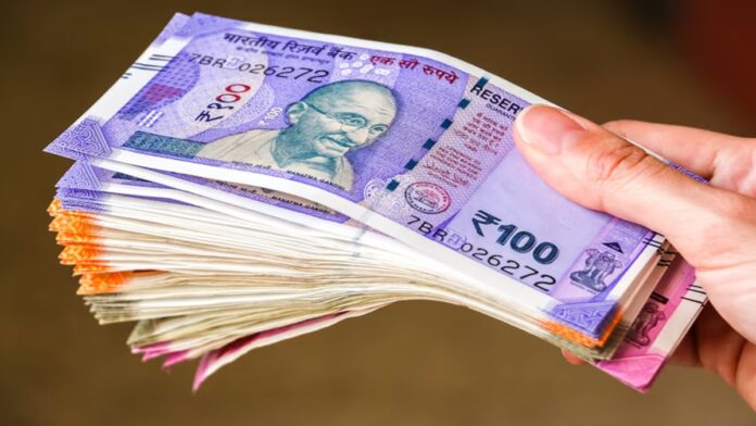 Rupee slips to all-time lows, closes below 85/$